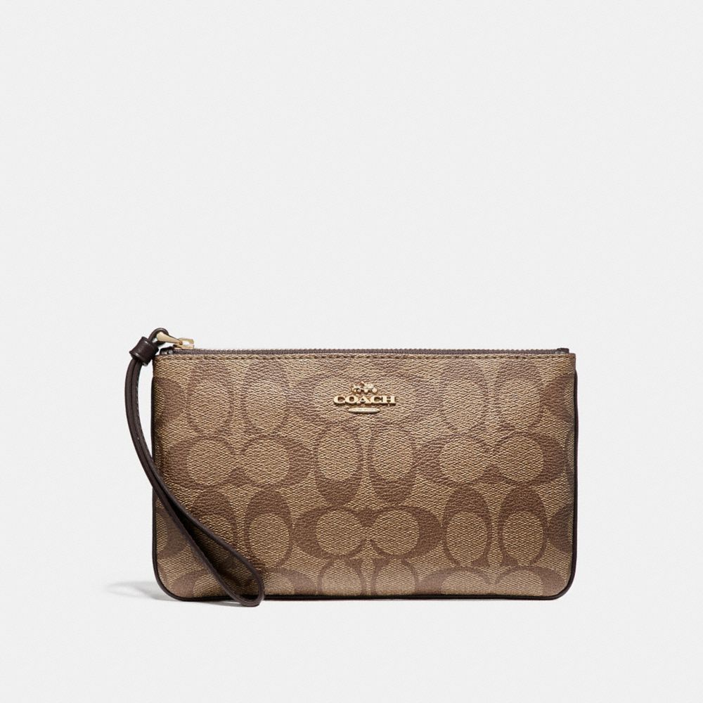 LARGE WRISTLET IN SIGNATURE COATED CANVAS - LIGHT GOLD/KHAKI - COACH F58695