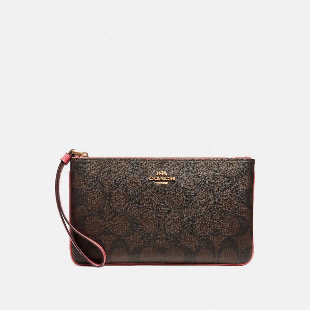 COACH LARGE WRISTLET IN SIGNATURE CANVAS - BROWN/PEONY/LIGHT GOLD - F58695