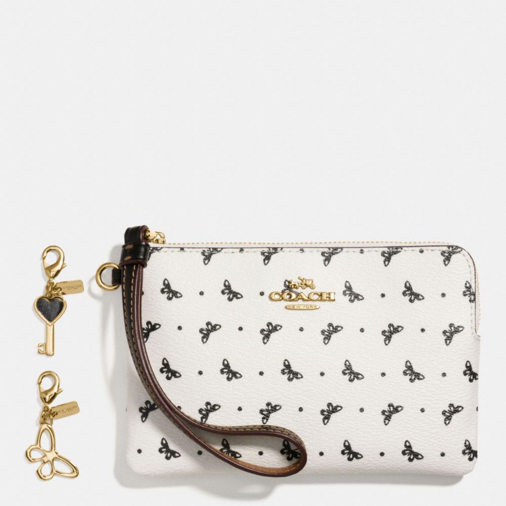 BOXED CORNER ZIP WRISTLET IN BUTTERFLY DOT PRINT COATED CANVAS WITH CHARMS - f59068 - IMITATION GOLD/CHALK/BLACK