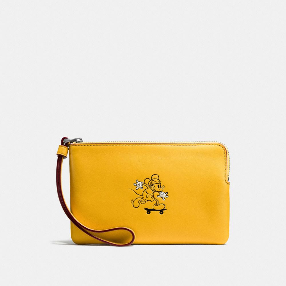 CORNER ZIP WRISTLET IN GLOVE CALF LEATHER WITH MICKEY - BLACK ANTIQUE NICKEL/BANANA - COACH F59528