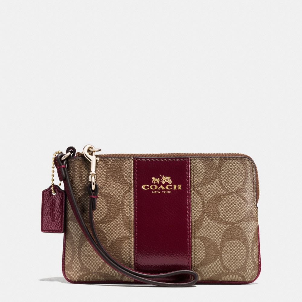 COACH f64233 CORNER ZIP WRISTLET IN SIGNATURE WITH LEATHER TRIM IMITATION GOLD/KHAKI/SHERRY