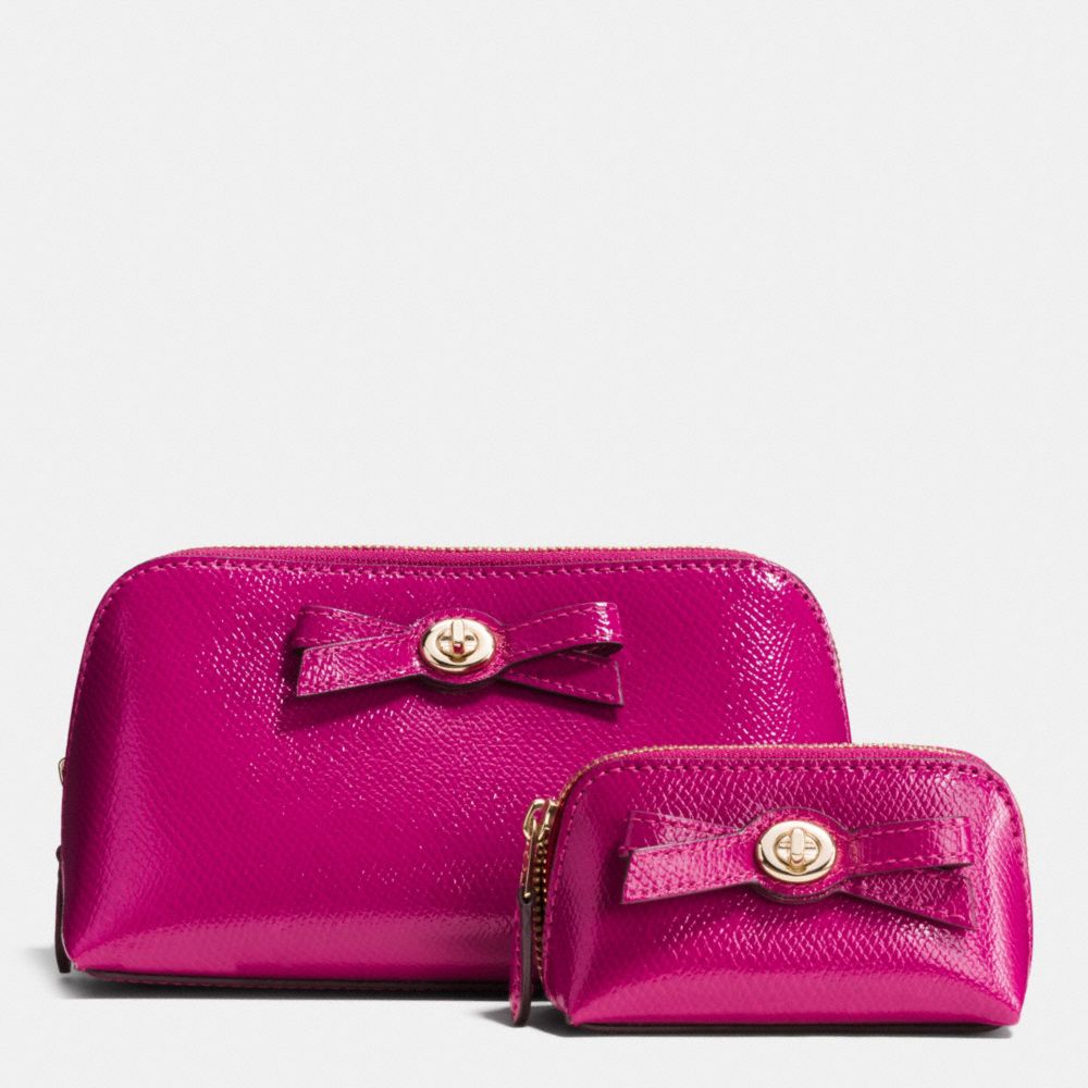 TURNLOCK BOW COSMETIC CASE SET IN PATENT LEATHER - f64651 - IMITATION GOLD/CRANBERRY