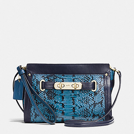 COACH f64731 COACH SWAGGER WRISTLET IN COLORBLOCK EXOTIC EMBOSSED LEATHER LIGHT GOLD/NAVY