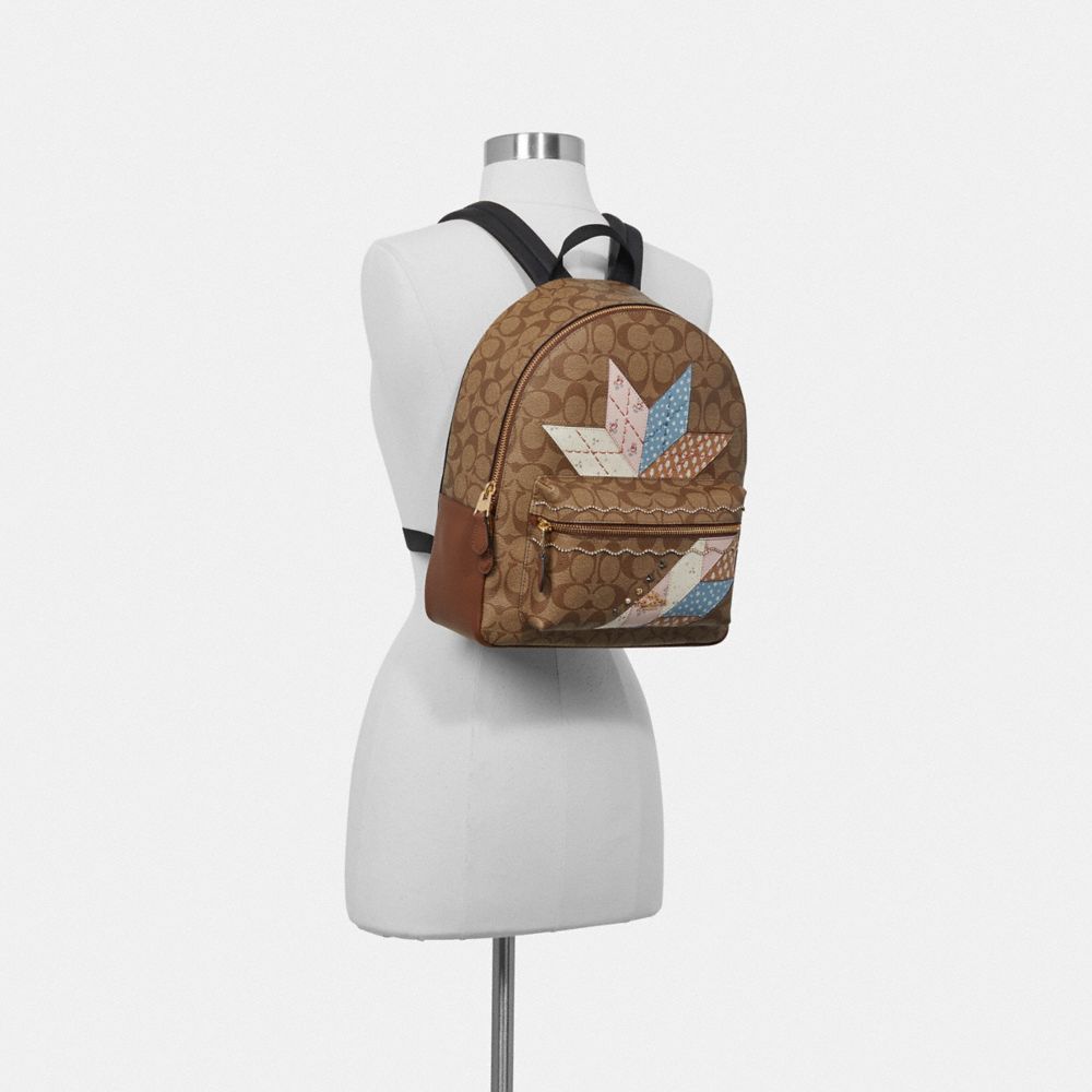 COACH F67369 MEDIUM CHARLIE BACKPACK IN SIGNATURE CANVAS WITH STAR PATCHWORK KHAKI MULTI/LIGHT GOLD