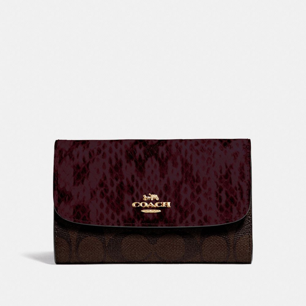 COACH F67498 - MEDIUM ENVELOPE WALLET IN SIGNATURE CANVAS BROWN BLACK/MULTI/IMITATION GOLD