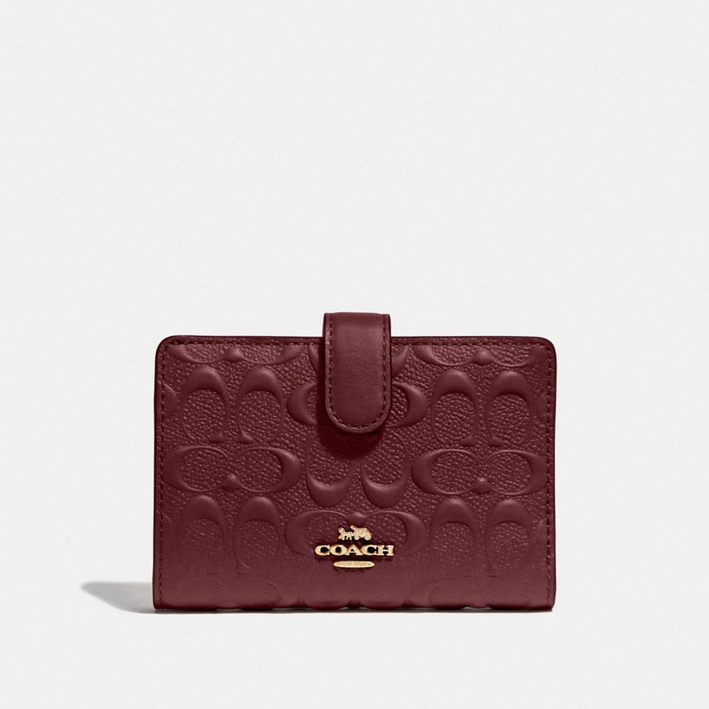 COACH MEDIUM CORNER ZIP WALLET IN SIGNATURE LEATHER - WINE/IMITATION GOLD - F67565