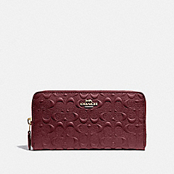 ACCORDION ZIP WALLET IN SIGNATURE LEATHER - WINE/IMITATION GOLD - COACH F67566