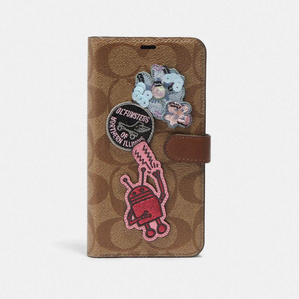 COACH KEITH HARING IPHONE XS MAX FOLIO IN SIGNATURE CANVAS WITH PATCHES - KHAKI MULTI - F68428