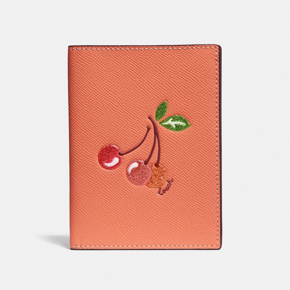 COACH PASSPORT CASE WITH CHERRY - LIGHT CORAL/GOLD - F68621