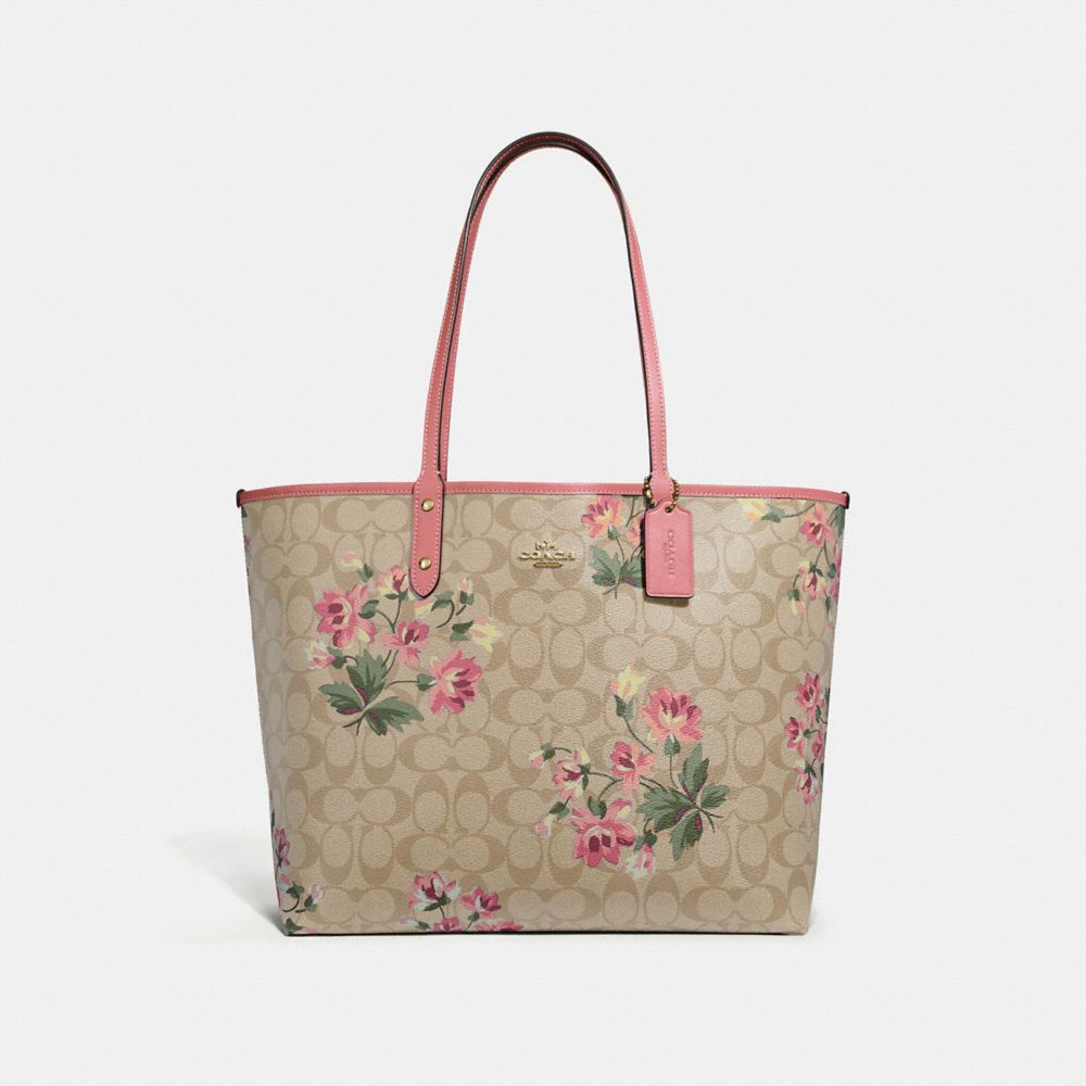 REVERSIBLE CITY TOTE IN SIGNATURE CANVAS WITH LILY PRINT - LIGHT KHAKI MULTI/ROSE PETAL/IMITATION GOLD - COACH F72844