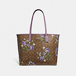 REVERSIBLE CITY TOTE IN SIGNATURE CANVAS WITH LILY PRINT - KHAKI MULTI/JASMINE/SILVER - COACH F72844