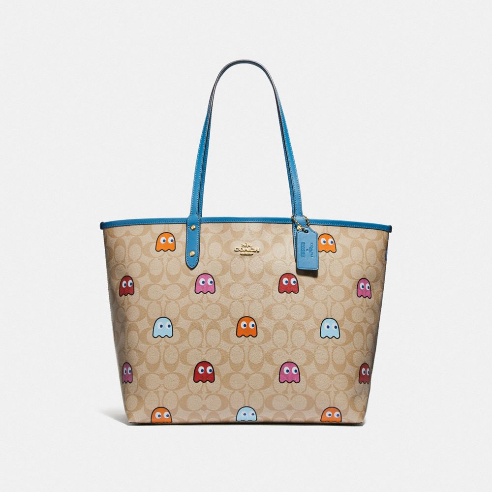 COACH REVERSIBLE CITY TOTE IN SIGNATURE CANVAS WITH PAC-MAN GHOSTS PRINT - LIGHT KHAKI MULTI/RIVER/GOLD - F72905