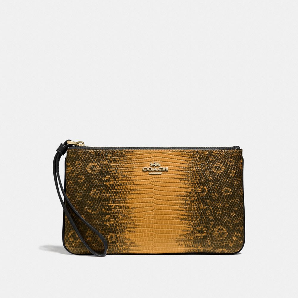 coach mustard wristlet gold