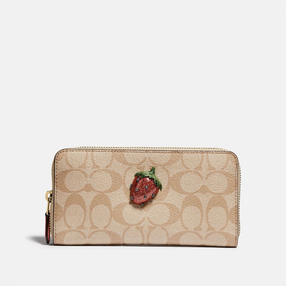 COACH ACCORDION ZIP WALLET IN SIGNATURE CANVAS WITH FRUIT - LIGHT KHAKI/CORAL/GOLD - F73081