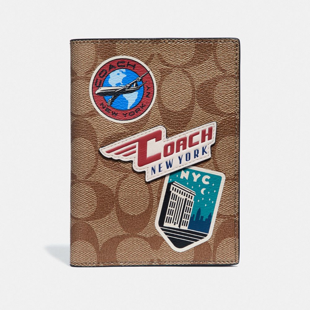 COACH PASSPORT CASE IN SIGNATURE CANVAS WITH TRAVEL PATCHES - KHAKI/MULTI - F73083