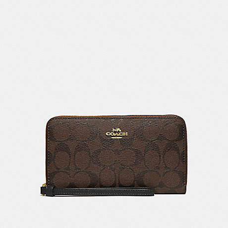 COACH LARGE PHONE WALLET IN SIGNATURE CANVAS - BROWN/BLACK/IMITATION GOLD - F73418