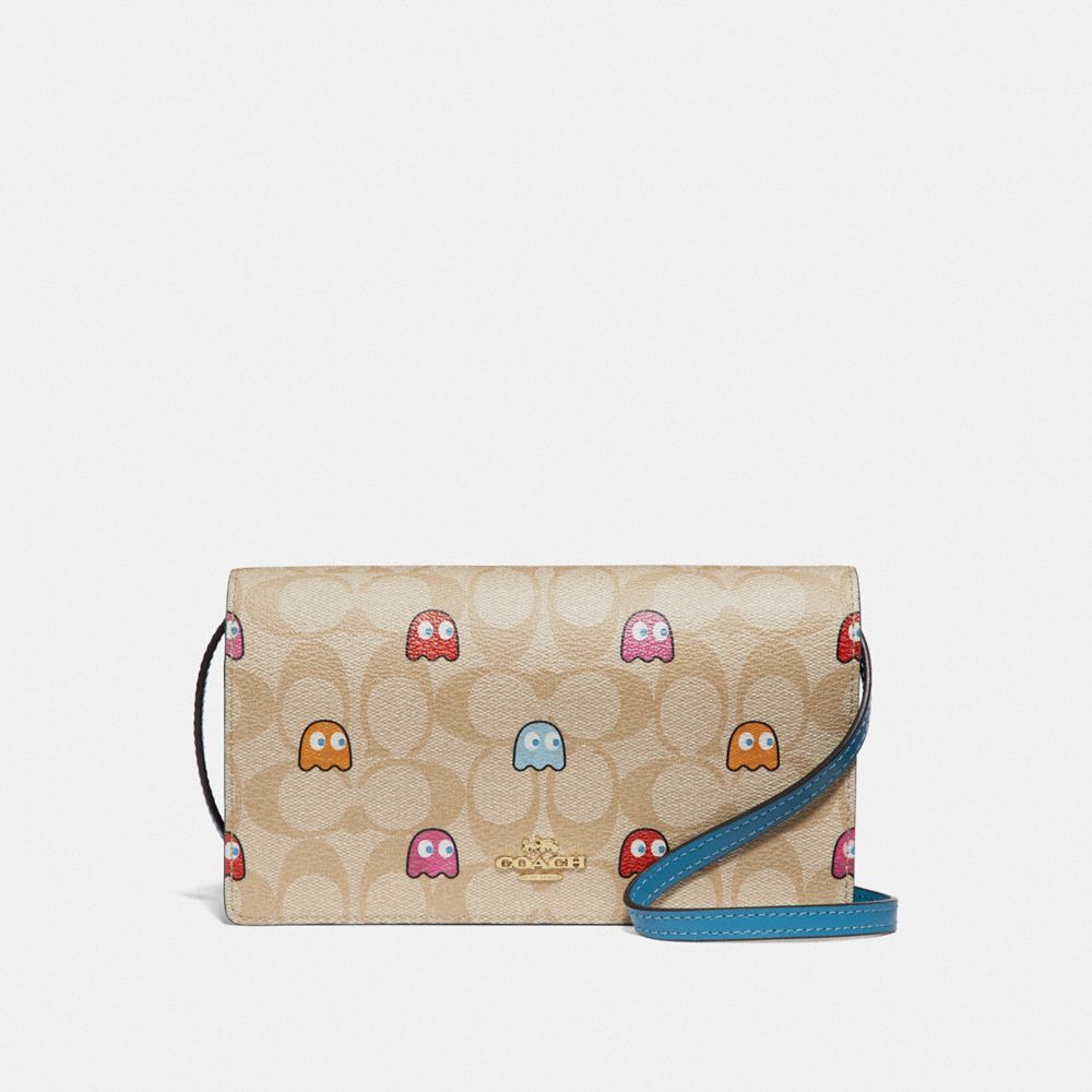 HAYDEN FOLDOVER CROSSBODY CLUTCH IN SIGNATURE CANVAS WITH PAC-MAN GHOSTS PRINT - F73447 - LIGHT KHAKI MULTI/GOLD