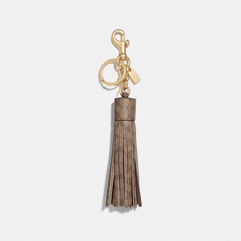 COACH F74076 TASSEL BAG CHARM IN SIGNATURE CANVAS KHAKI/GOLD