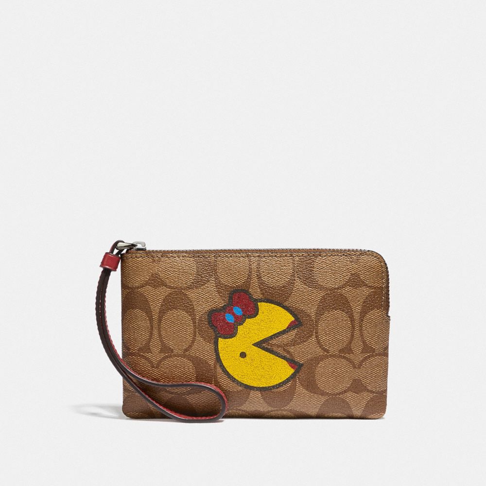 COACH F75594 CORNER ZIP WRISTLET IN SIGNATURE CANVAS WITH MS. PAC-MAN KHAKI MULTI/SILVER