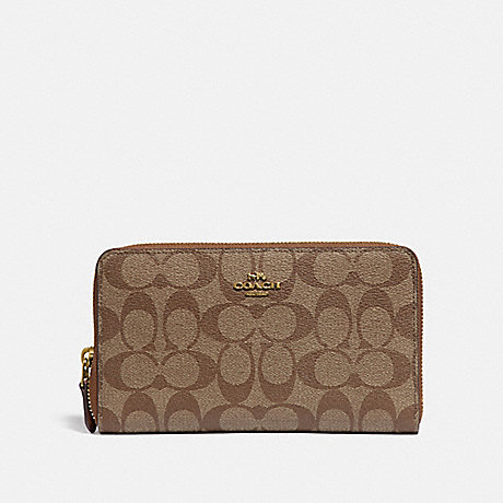 COACH CONTINENTAL ZIP AROUND WALLET IN SIGNATURE CANVAS - KHAKI/SADDLE 2/GOLD - F76579