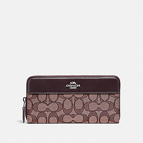 COACH ACCORDION ZIP WALLET IN SIGNATURE JACQUARD WITH STRIPE - SV/RASPBERRY - F76638