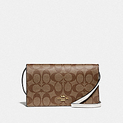 HAYDEN FOLDOVER CROSSBODY CLUTCH IN SIGNATURE CANVAS - IM/KHAKI/CHALK - COACH F76769