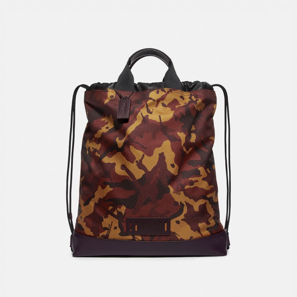 COACH TERRAIN DRAWSTRING BACKPACK WITH CAMO PRINT - RUST/BLACK ANTIQUE NICKEL - F76784