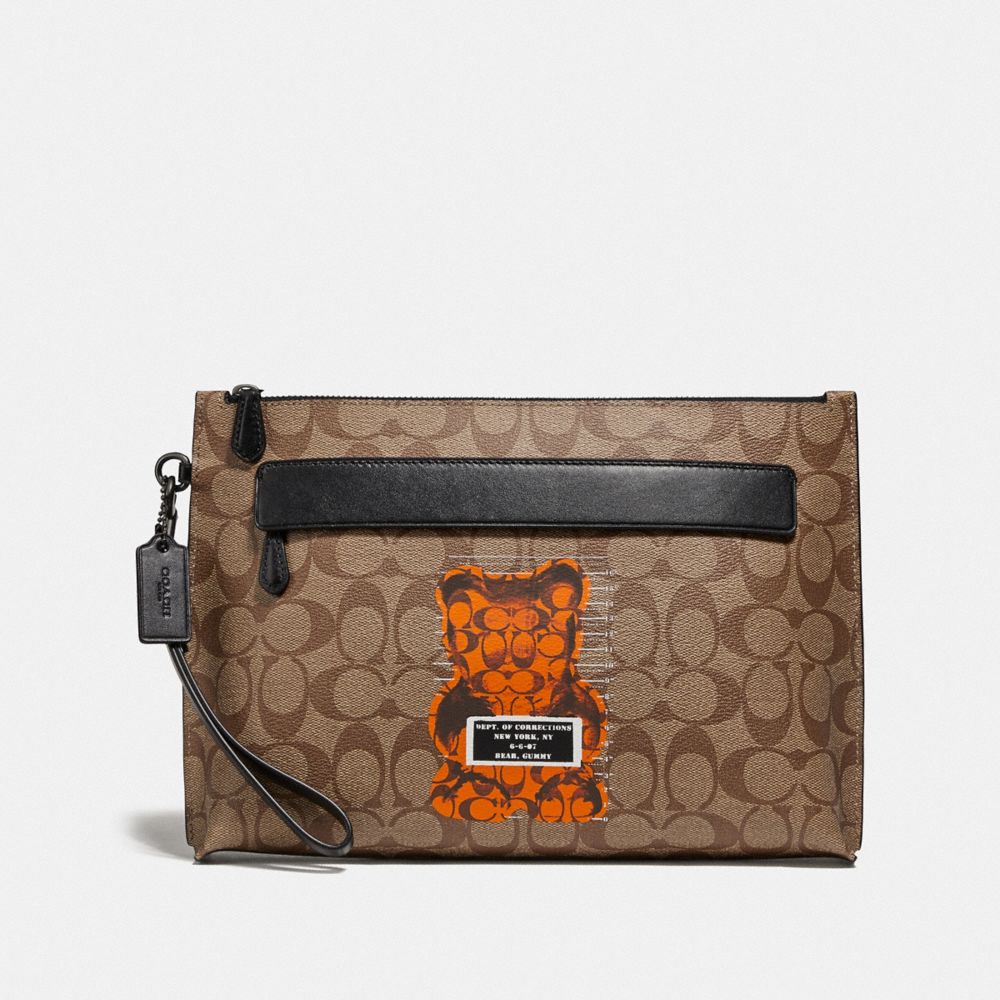CARRYALL POUCH IN SIGNATURE CANVAS WITH VANDAL GUMMY - F76858 - TAN/BLACK ANTIQUE NICKEL