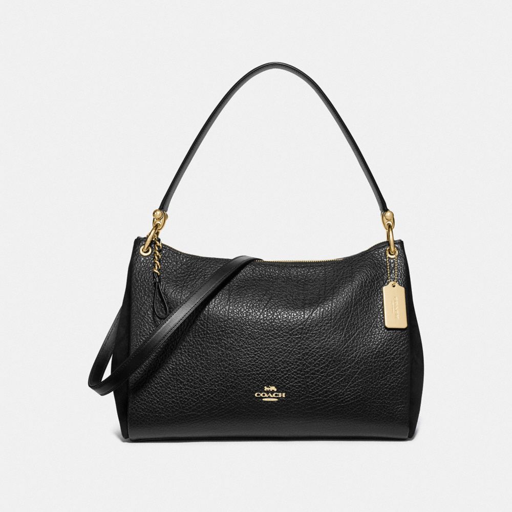 black and gold coach purse