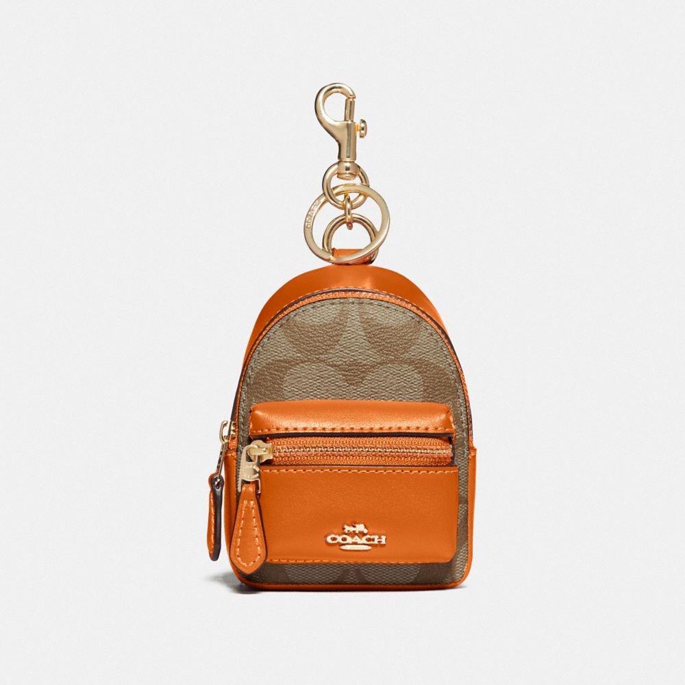 COACH F76937 - BACKPACK COIN CASE IN SIGNATURE CANVAS KHAKI/DARK ORANGE/GOLD