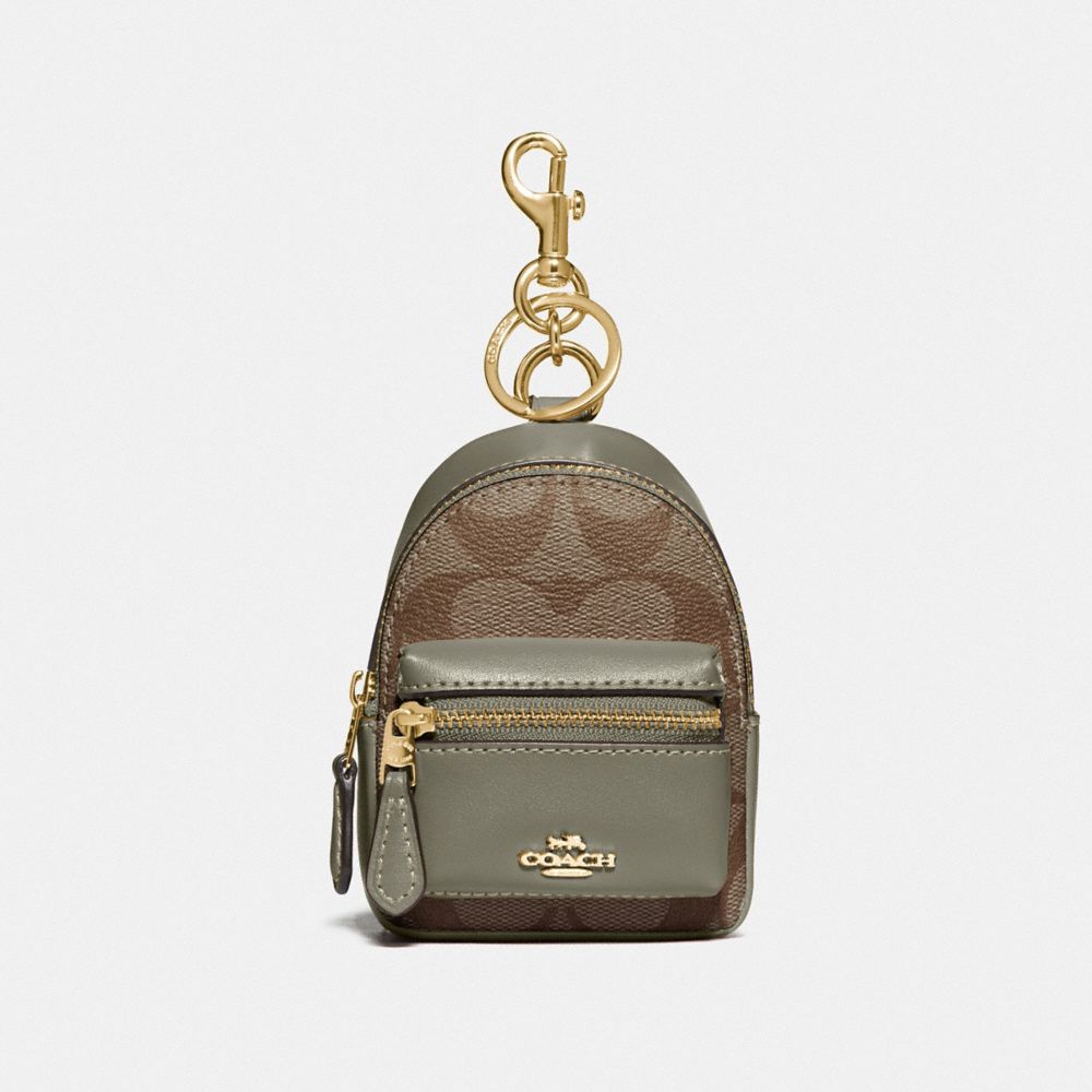 BACKPACK COIN CASE IN SIGNATURE CANVAS - KHAKI/MILITARY GREEN/GOLD - COACH F76937