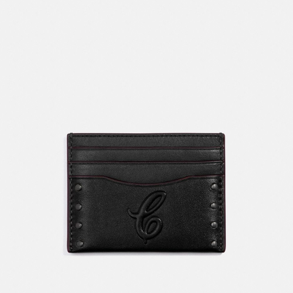 SLIM CARD CASE WITH SIGNATURE MOTIF AND STUDS - QB/BLACK - COACH F76967