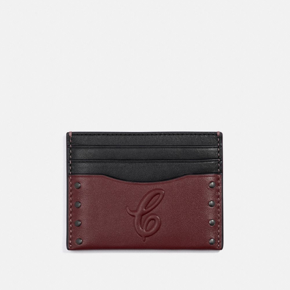 SLIM CARD CASE WITH SIGNATURE MOTIF AND STUDS - QB/CURRANT - COACH F76967