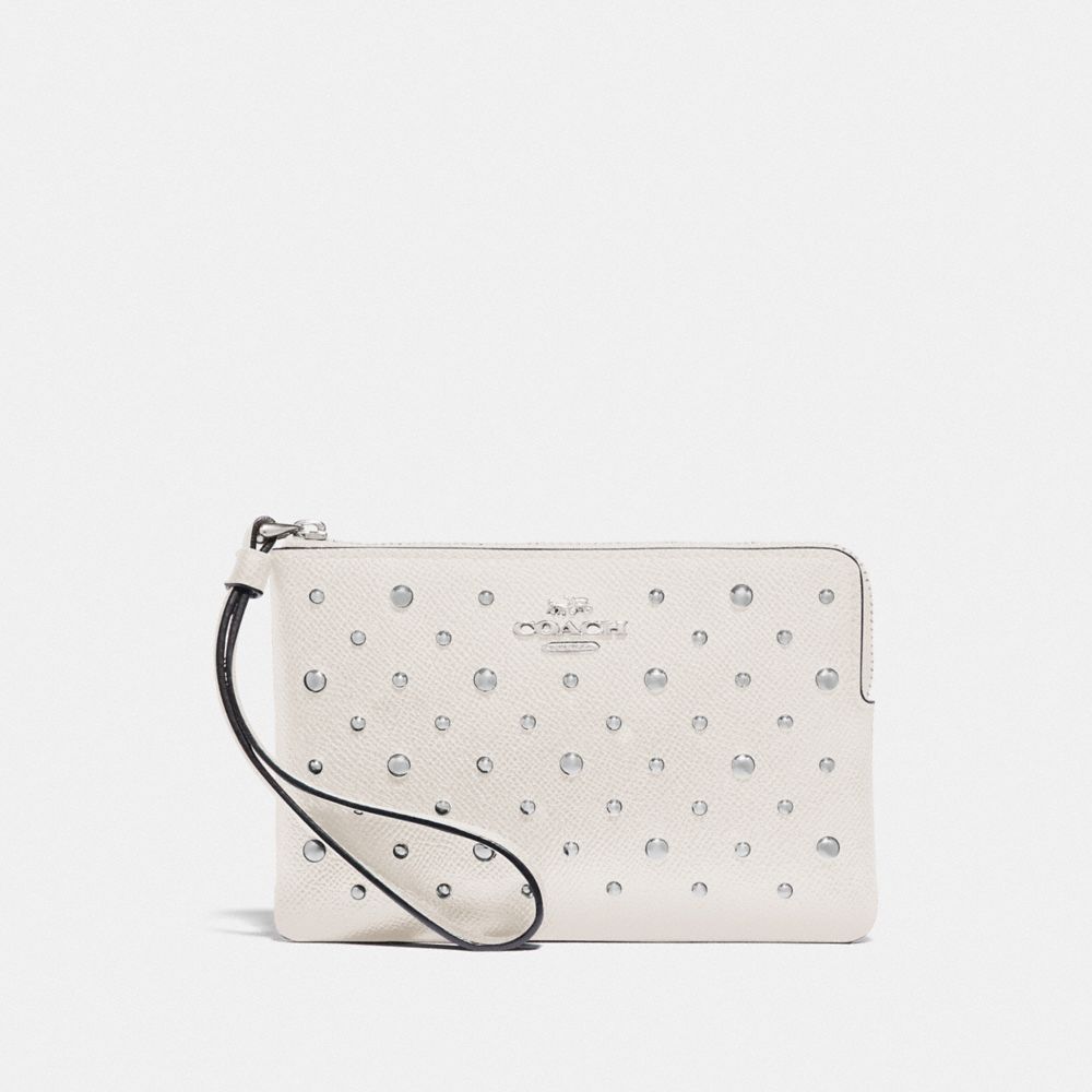 COACH CORNER ZIP WRISTLET WITH RIVETS - CHALK/SILVER - F78050