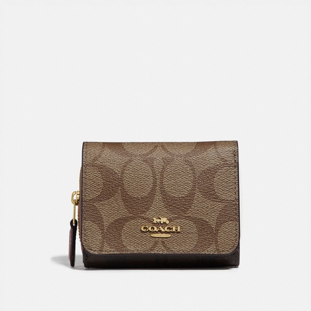 COACH SMALL TRIFOLD WALLET IN BLOCKED SIGNATURE CANVAS - IM/KHAKI PINK PETAL - F78081