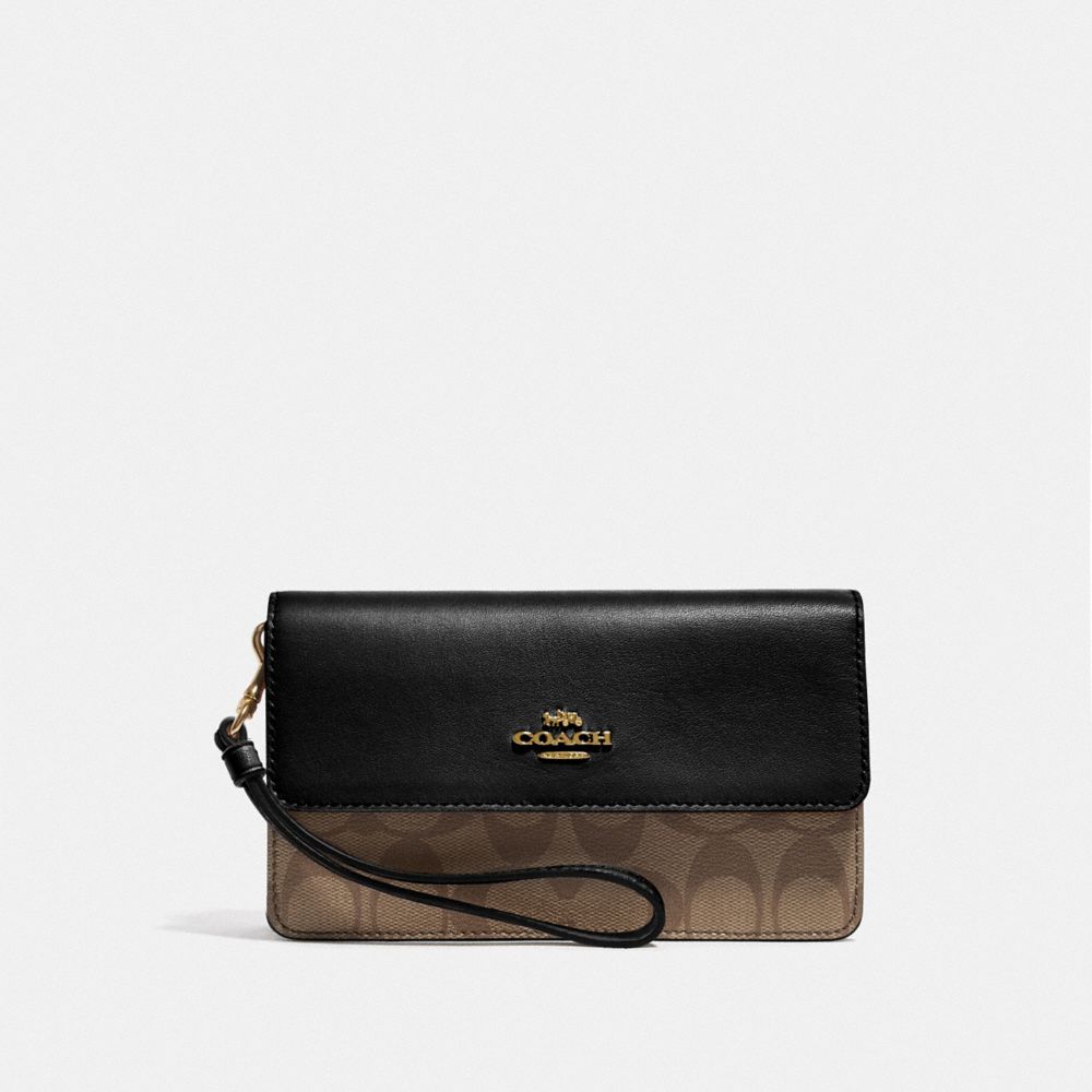 COACH FOLDOVER WRISTLET IN SIGNATURE CANVAS - KHAKI/BLACK/IMITATION GOLD - F78229