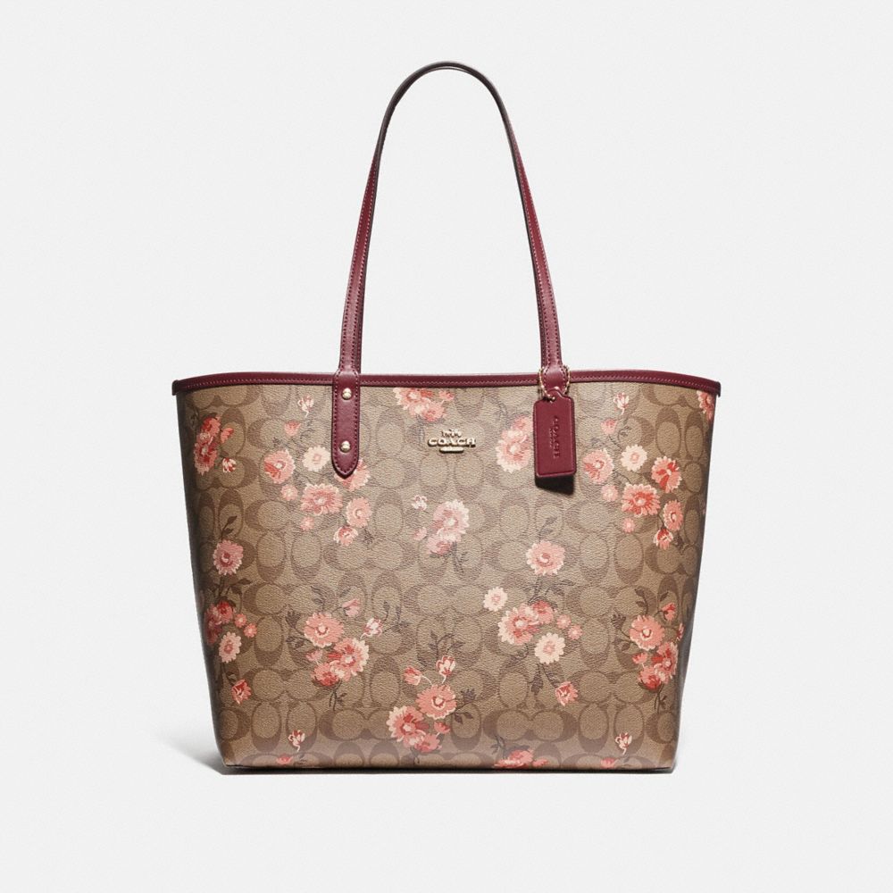 REVERSIBLE CITY TOTE IN SIGNATURE CANVAS WITH PRAIRIE DAISY CLUSTER PRINT - F78279 - KHAKI CORAL MULTI/WINE/IMITATION GOLD