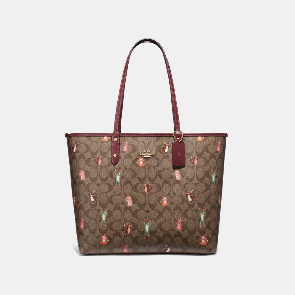 REVERSIBLE CITY TOTE IN SIGNATURE CANVAS WITH PARTY ANIMALS PRINT - F80246 - IM/KHAKI PINK MULTI WINE