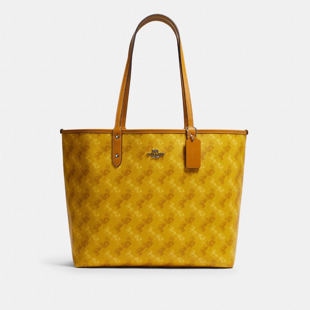 COACH REVERSIBLE CITY TOTE WITH HORSE AND CARRIAGE PRINT - SV/YELLOW MULTI - F82134