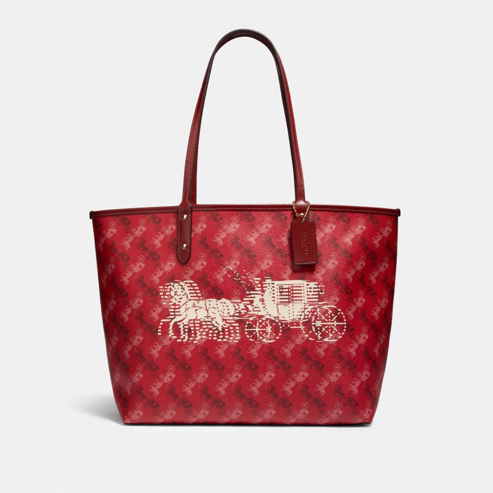 Coach reversible city online tote with skyline print