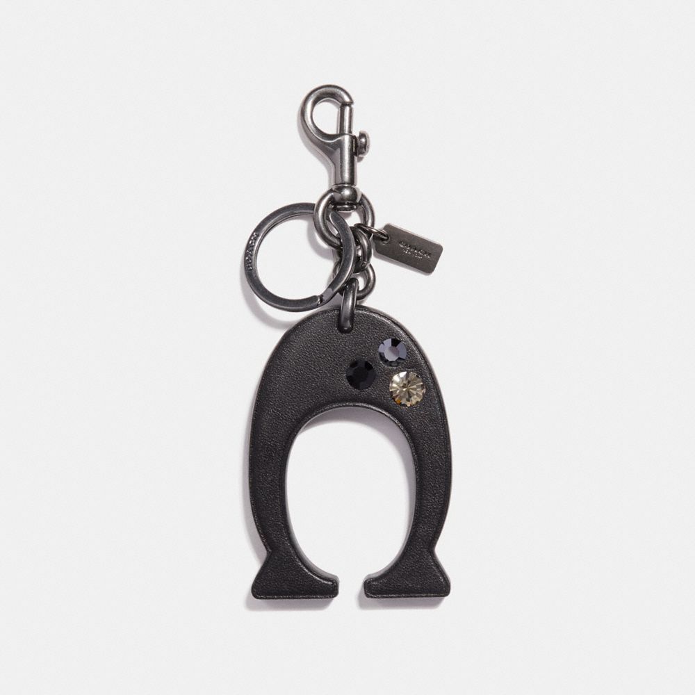 Bag charm Coach Black in Not specified - 26117436