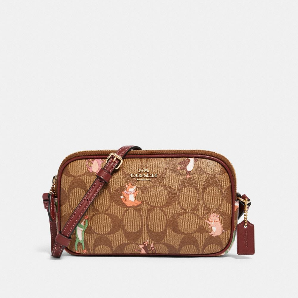 COACH CROSSBODY POUCH IN SIGNATURE CANVAS WITH PARTY ANIMALS PRINT - IM/KHAKI PINK MULTI - F87850