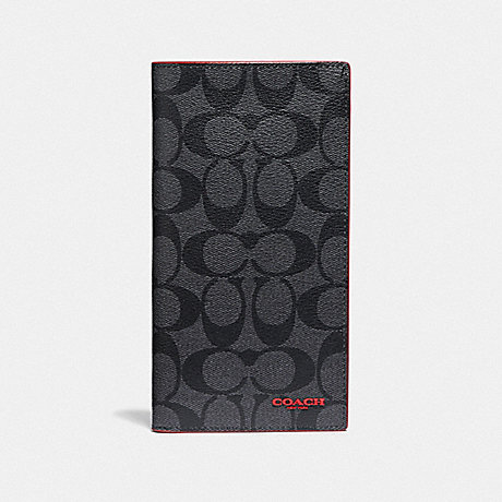 COACH SLIM PASSPORT WALLET IN SIGNATURE CANVAS - QB/CHARCOAL SPORT RED - F87851