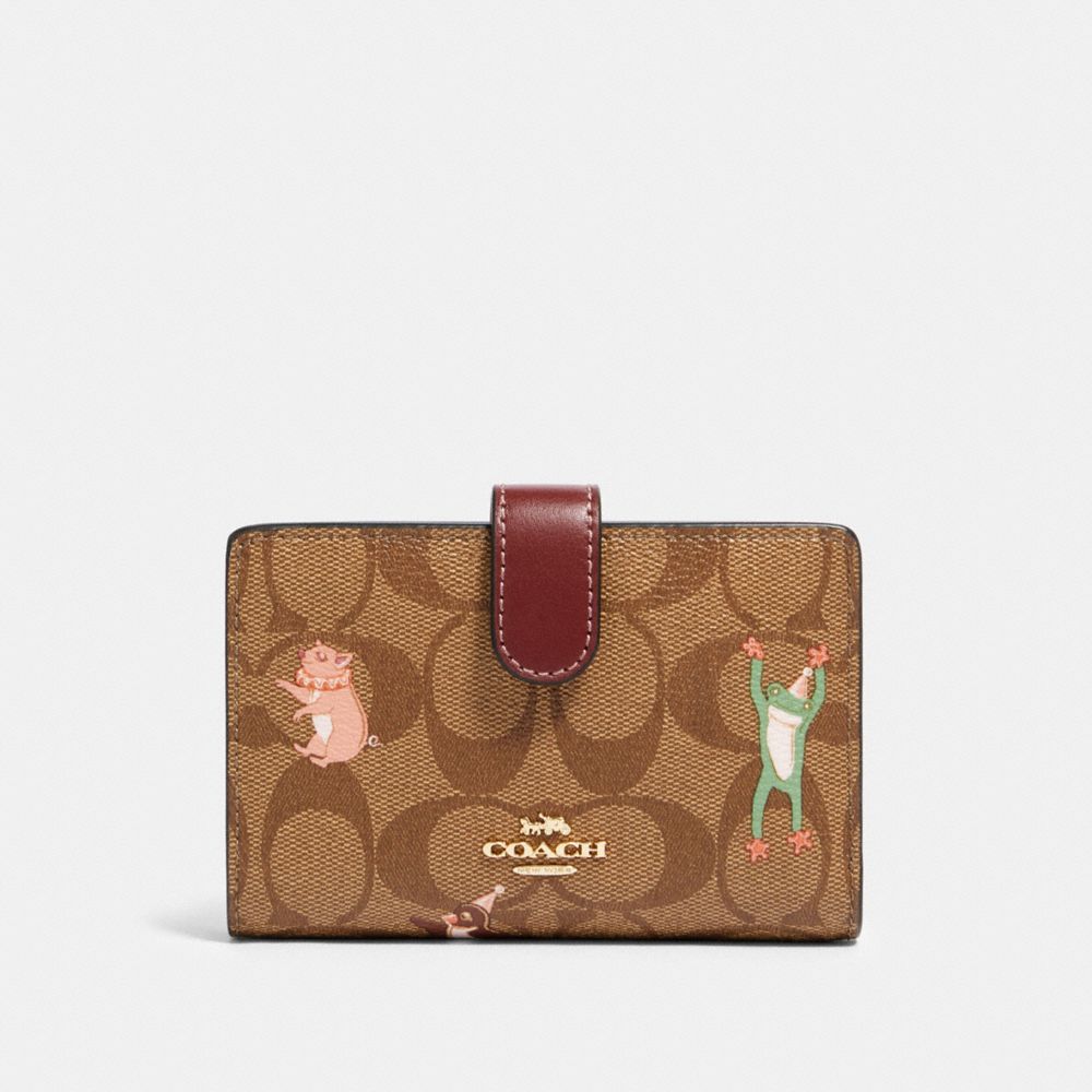 COACH F87911 MEDIUM CORNER ZIP WALLET IN SIGNATURE CANVAS WITH PARTY ANIMALS PRINT IM/KHAKI PINK MULTI