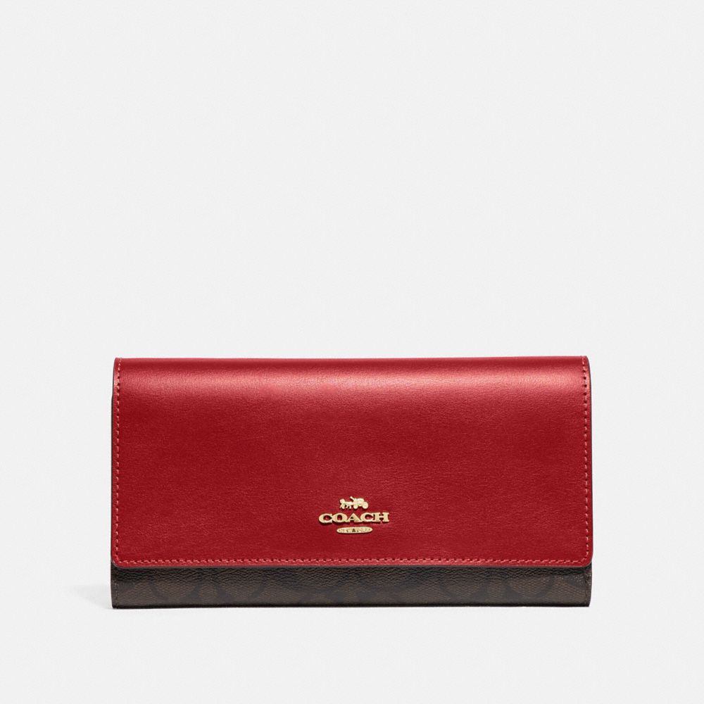 TRIFOLD WALLET IN SIGNATURE CANVAS - IM/BROWN TRUE RED - COACH F88024