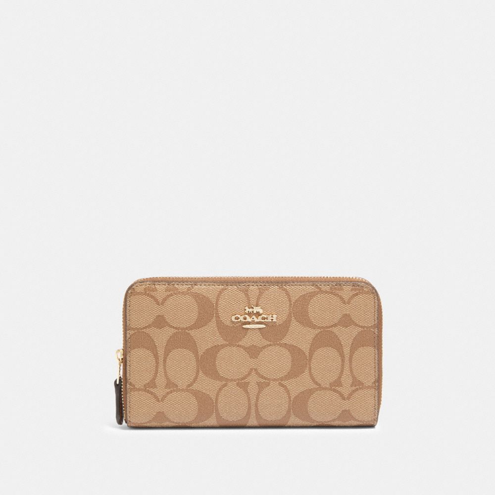 COACH MEDIUM ZIP AROUND WALLET IN SIGNATURE CANVAS - IM/KHAKI/SADDLE 2 - F88913