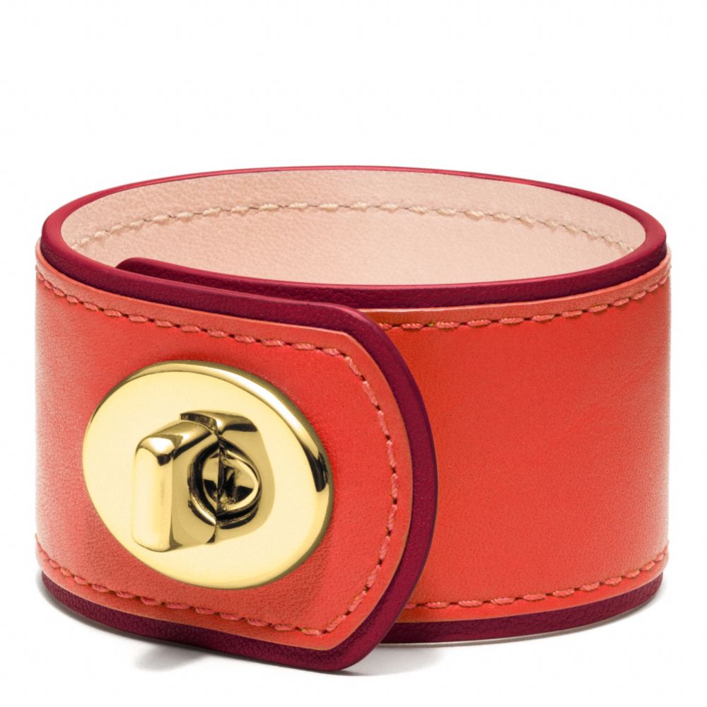 MEDIUM LEATHER TURNLOCK CUFF - f96319 - BRASS/ORANGE