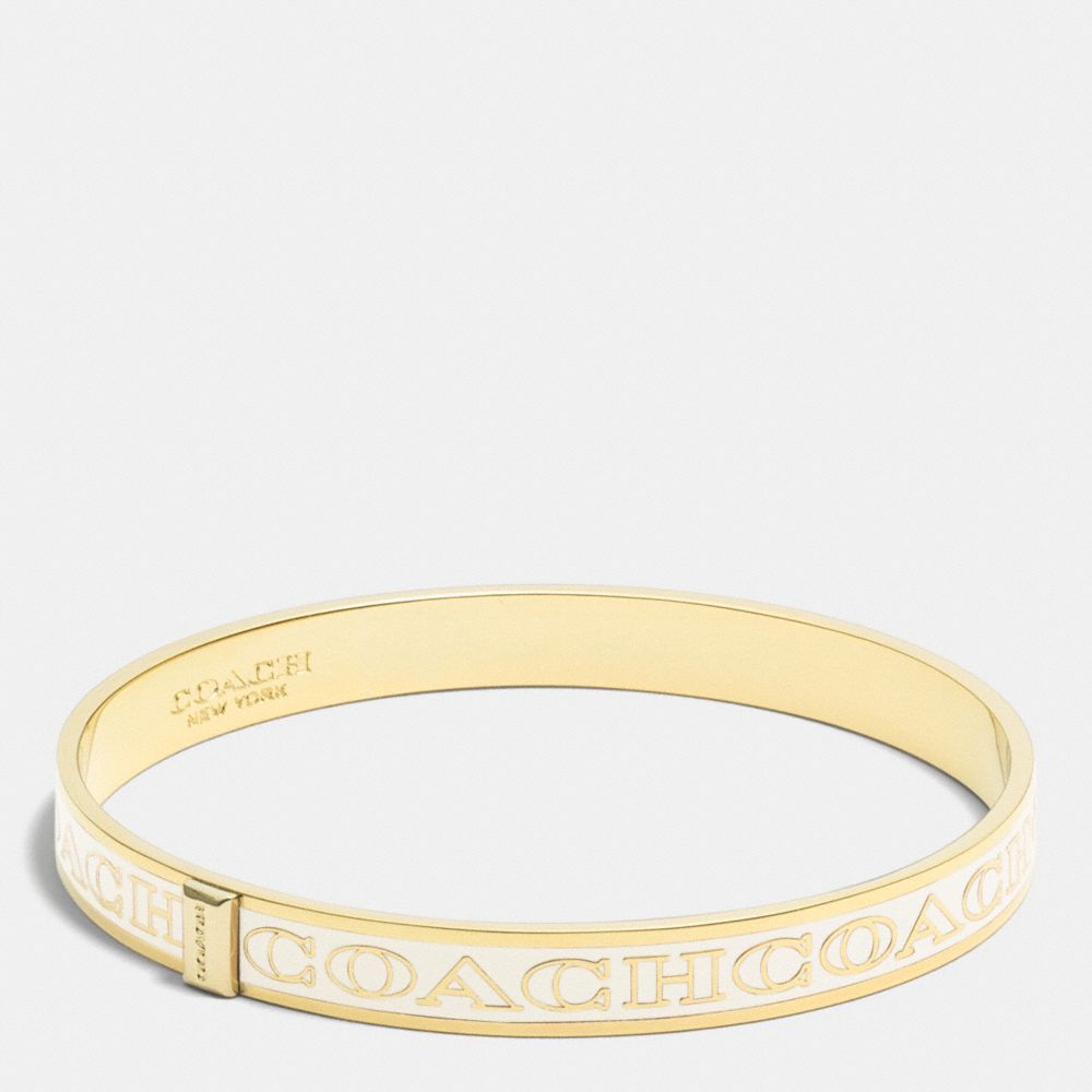 COACH f99983 THIN COACH LETTER LOGO BANGLE LIGHT GOLD/MILK