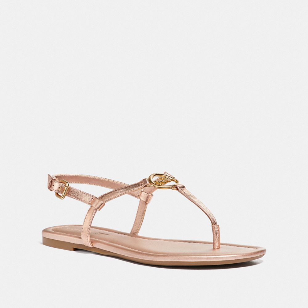 coach gold flip flops