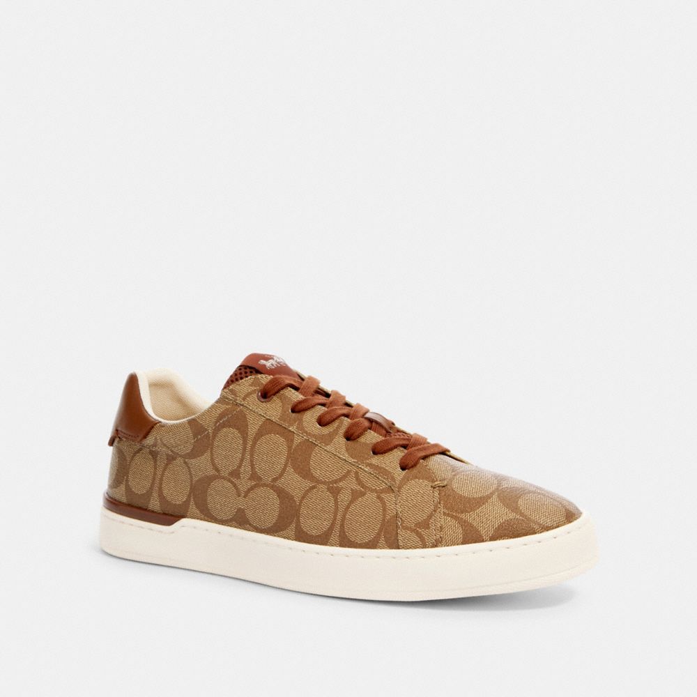 coach x peanuts clip low top sneaker with snoopy print